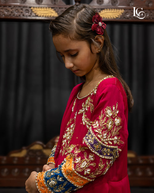 Aplic maxi with aplic work on sleeves